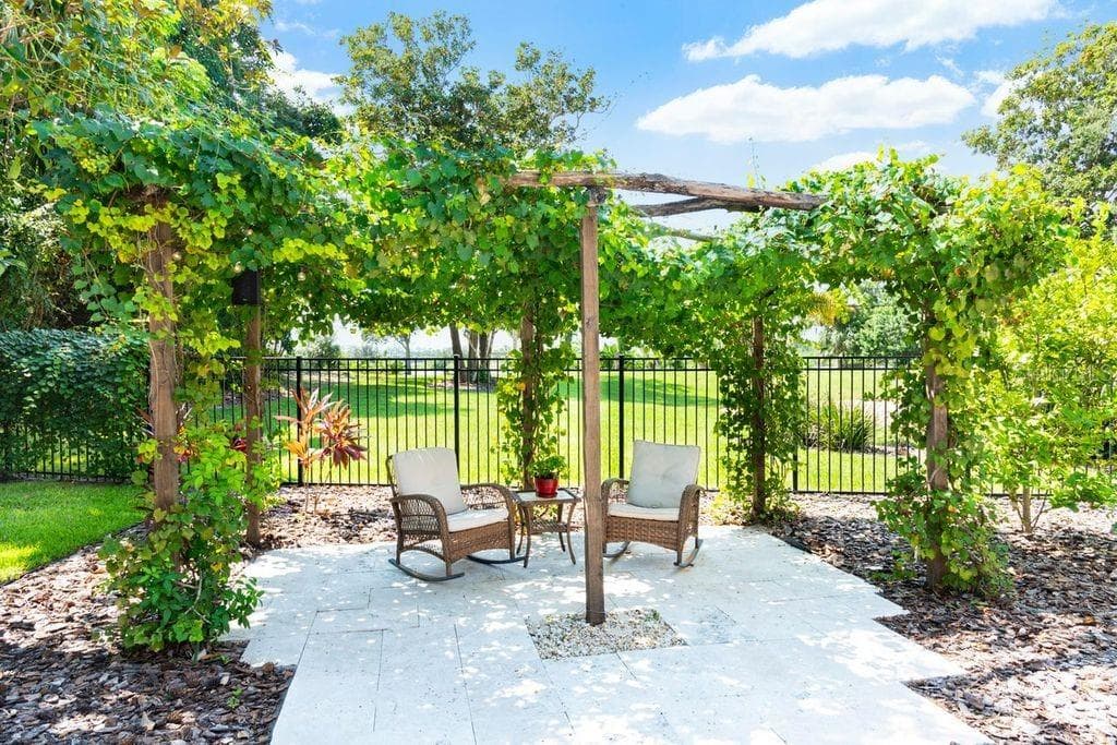Gazebo and landscape with river view - 2627 JOHN ANDERSON DR, ORMOND BEACH