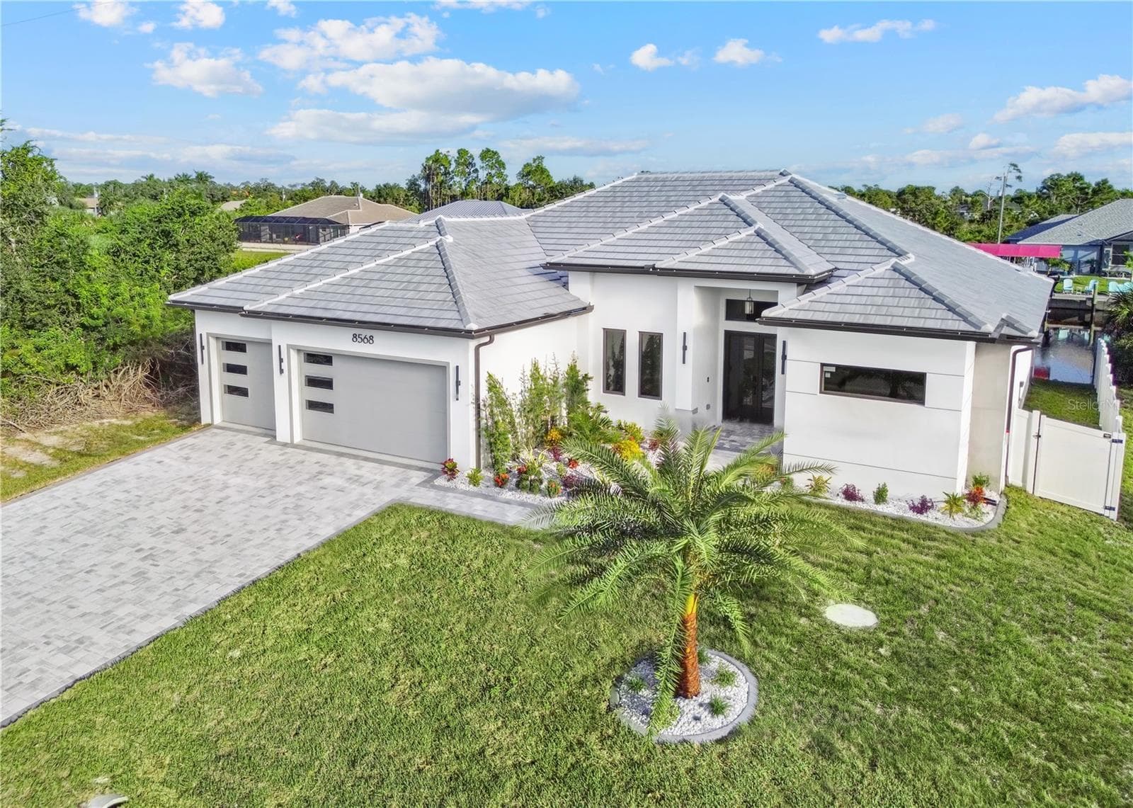 Angled Front Exterior View of Home - 8568 SANTA CRUZ DR, PORT CHARLOTTE