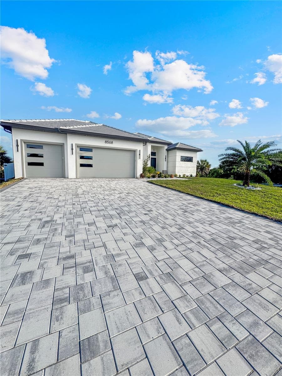 Paver Driveway and 3-Car Garage - 8568 SANTA CRUZ DR, PORT CHARLOTTE