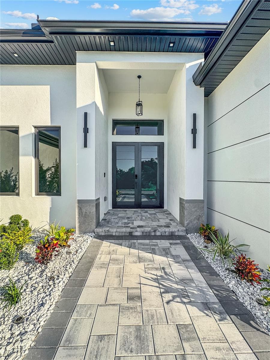 Covered Front Entryway and Double Entry Doors - 8568 SANTA CRUZ DR, PORT CHARLOTTE