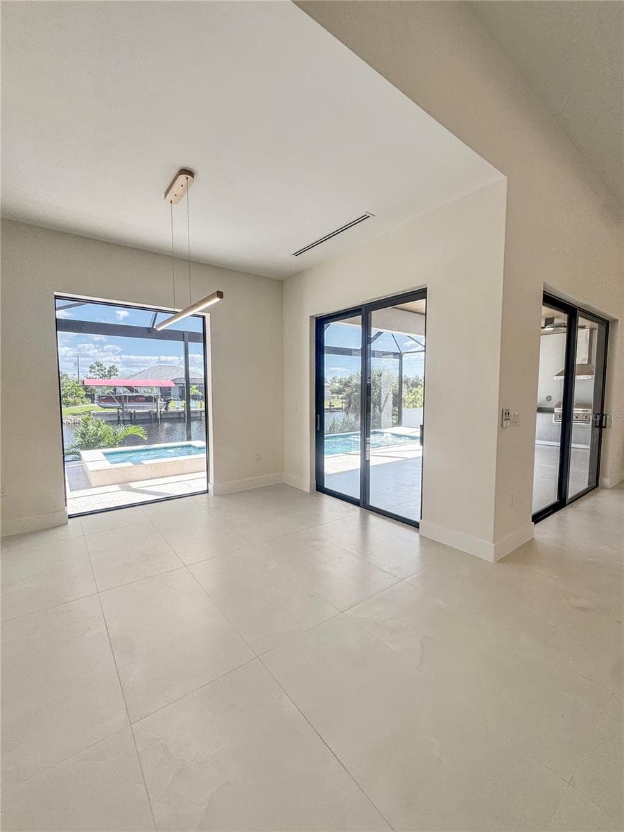 Dining Area with Porcelain Tile Flooring - 8568 SANTA CRUZ DR, PORT CHARLOTTE