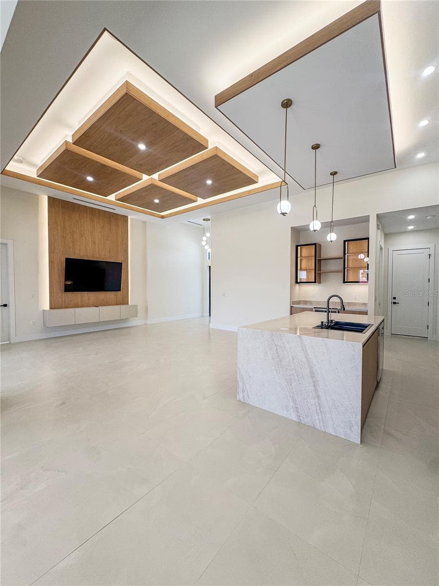 Kitchen and Living Area with Custom Ceiling Details - 8568 SANTA CRUZ DR, PORT CHARLOTTE
