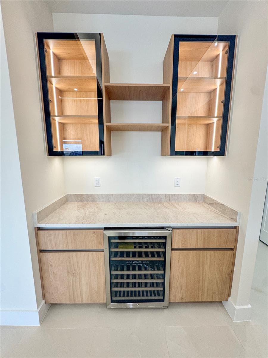 Custom Wet Bar with Wine Cooler and Glass-Front Cabinets - 8568 SANTA CRUZ DR, PORT CHARLOTTE