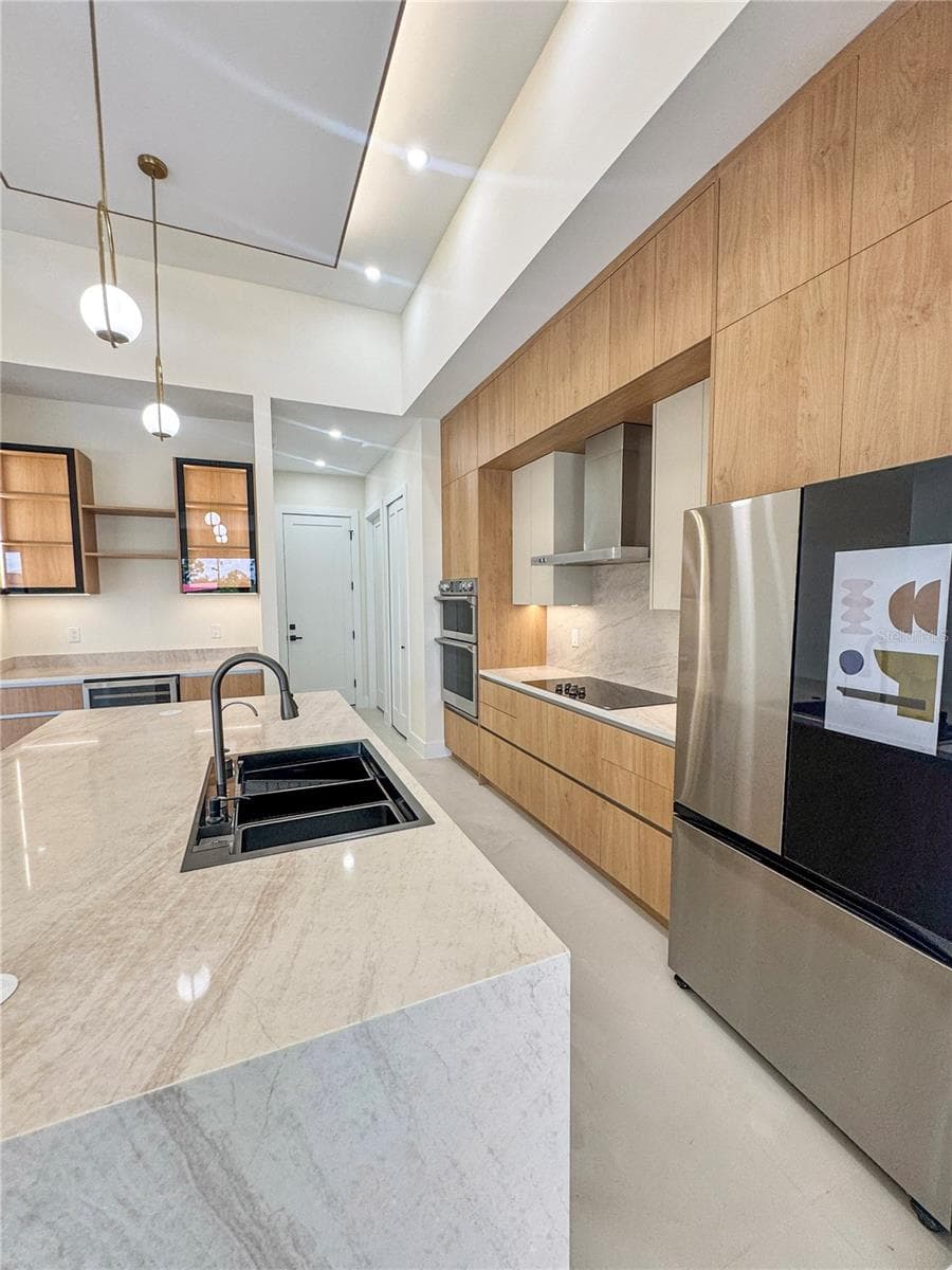 Kitchen with Built-In Appliances and Custom Cabinetry - 8568 SANTA CRUZ DR, PORT CHARLOTTE