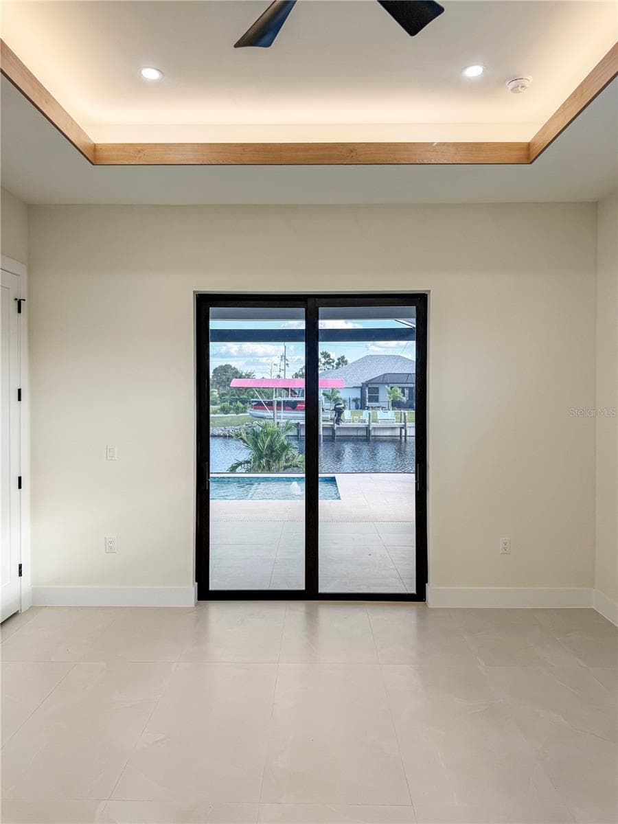 Master Bedroom with Sliding Glass Doors to Lanai - 8568 SANTA CRUZ DR, PORT CHARLOTTE