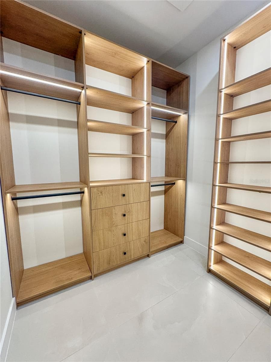 Master Walk-In Closet with Custom Cabinets - 8568 SANTA CRUZ DR, PORT CHARLOTTE
