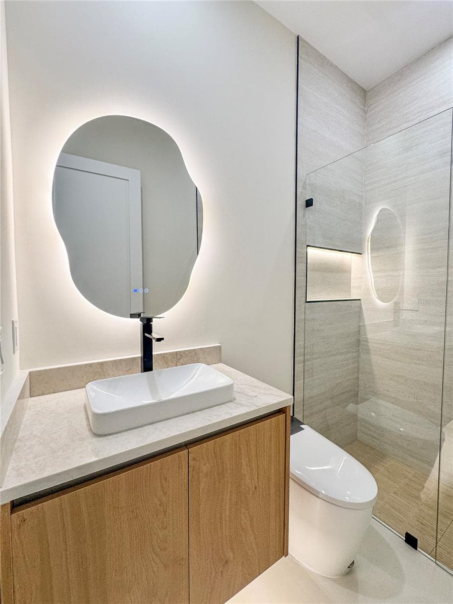 Bathroom 2 with Custom Vanity and LED Mirror - 8568 SANTA CRUZ DR, PORT CHARLOTTE