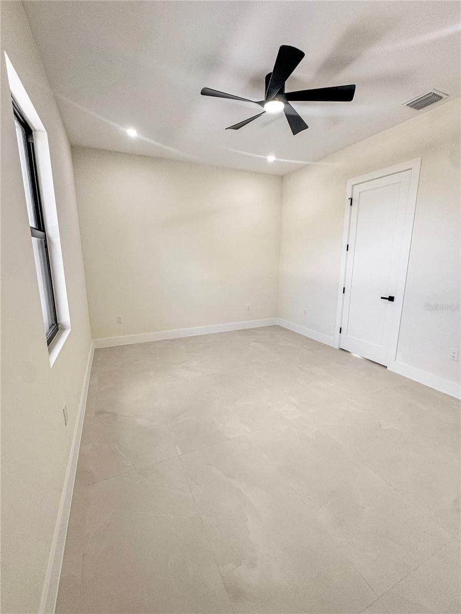 Bedroom 3 with Ceiling Fan and Porcelain Tile Flooring - 8568 SANTA CRUZ DR, PORT CHARLOTTE