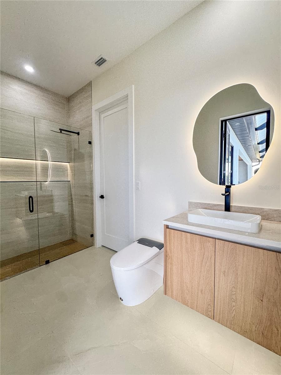 Bathroom 3 with Vanity, Toilet and Walk-In Shower - 8568 SANTA CRUZ DR, PORT CHARLOTTE