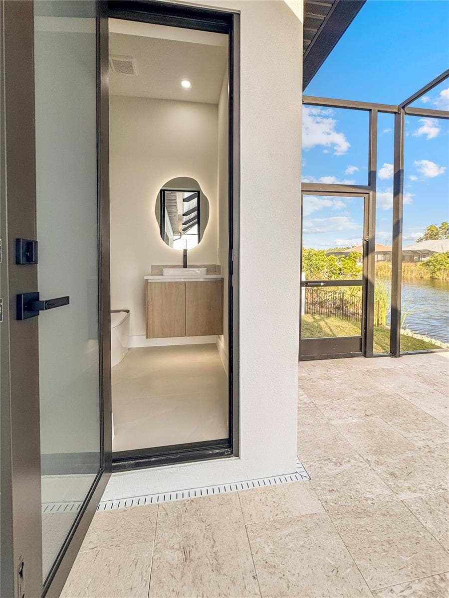 Bathroom 3 with Direct Access to the Pool Area - 8568 SANTA CRUZ DR, PORT CHARLOTTE