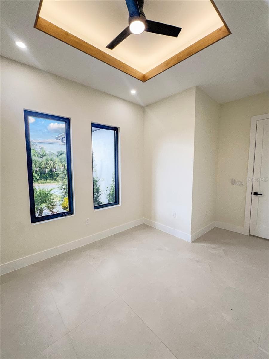 Bedroom 4 with Ceiling Fan and Porcelain Tile Flooring - 8568 SANTA CRUZ DR, PORT CHARLOTTE