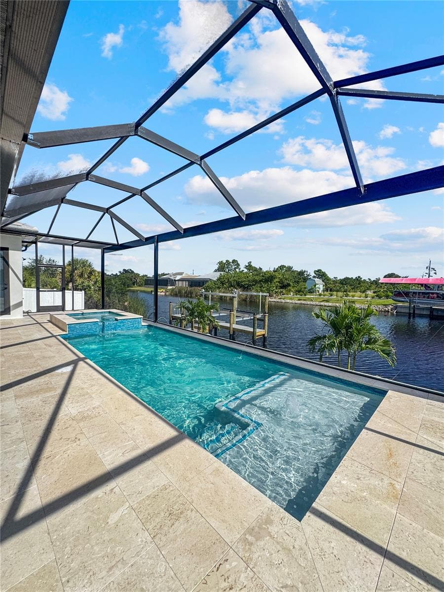 Heated Saltwater Pool with Screened Enclosure - 8568 SANTA CRUZ DR, PORT CHARLOTTE
