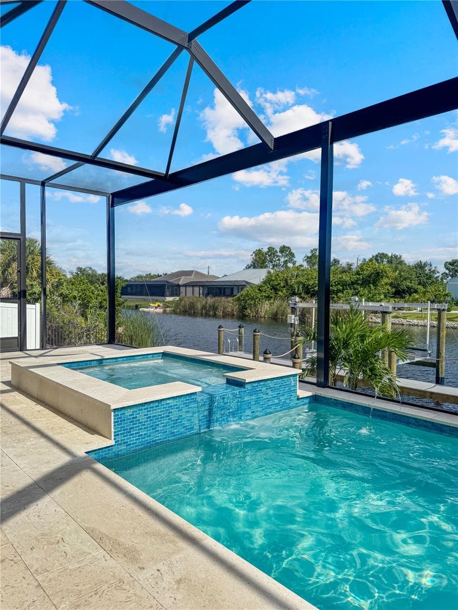 Pool Area with Canal View - 8568 SANTA CRUZ DR, PORT CHARLOTTE