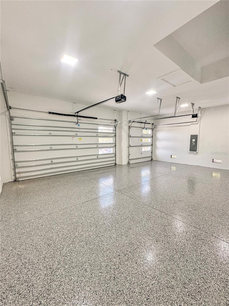 3-Car Garage with Epoxy Flooring - 8568 SANTA CRUZ DR, PORT CHARLOTTE