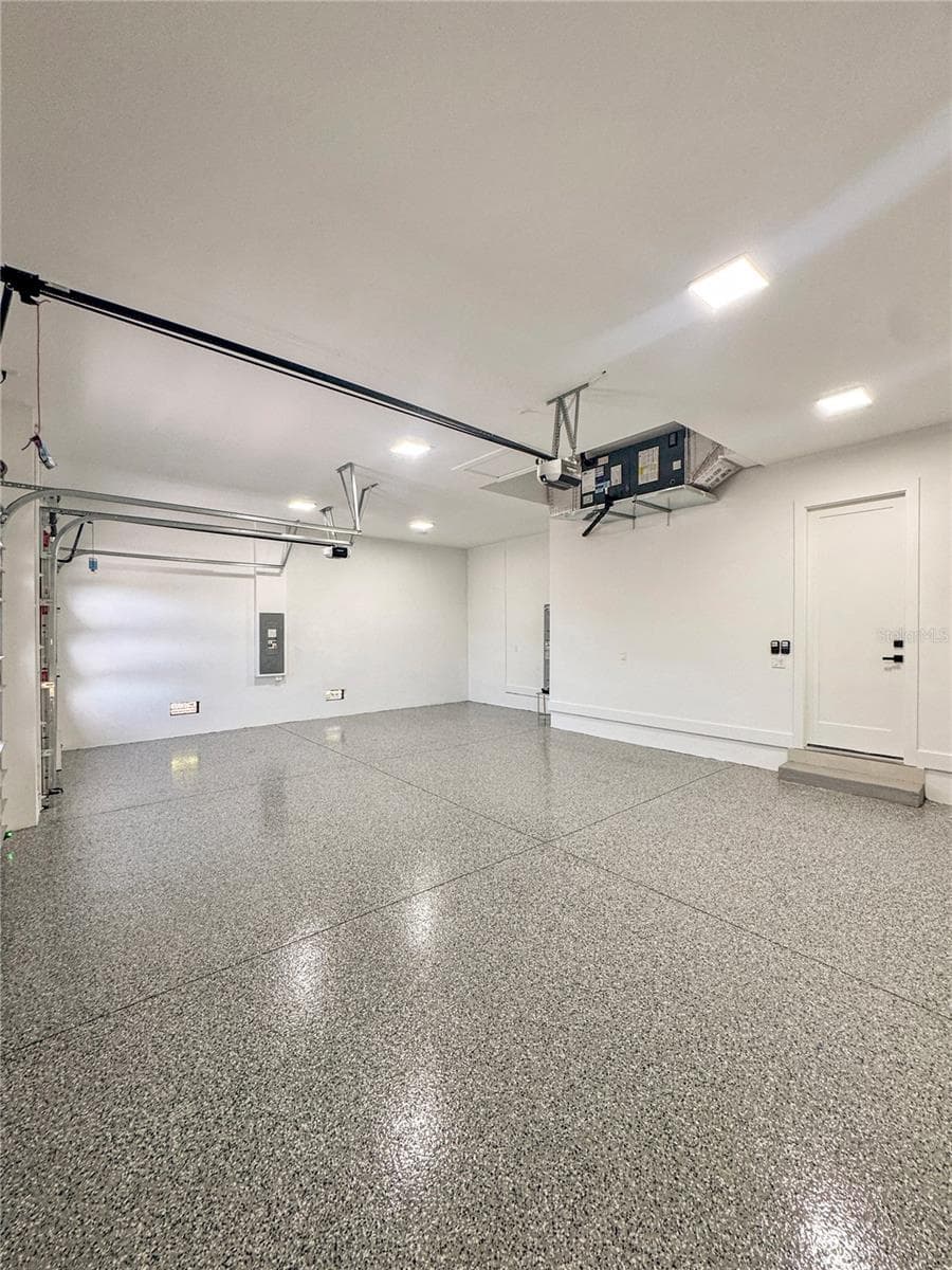 3-Car Garage with Epoxy Flooring - 8568 SANTA CRUZ DR, PORT CHARLOTTE