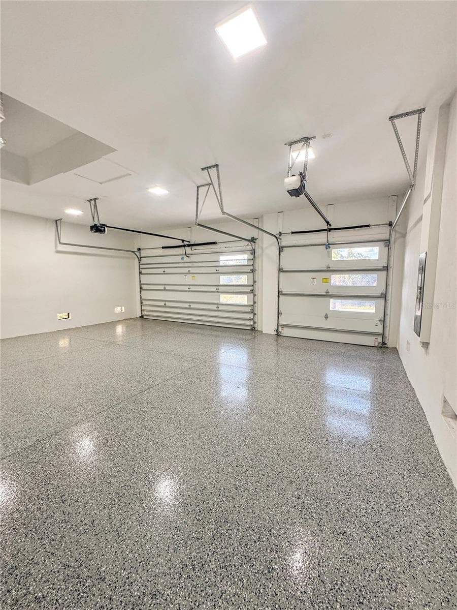 3-Car Garage with Epoxy Flooring - 8568 SANTA CRUZ DR, PORT CHARLOTTE