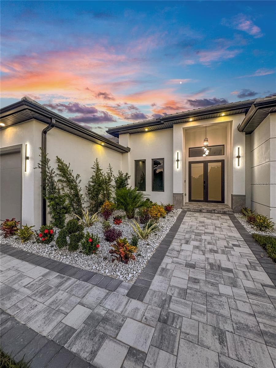 Front Entrance and Landscaping at Sunset - 8568 SANTA CRUZ DR, PORT CHARLOTTE
