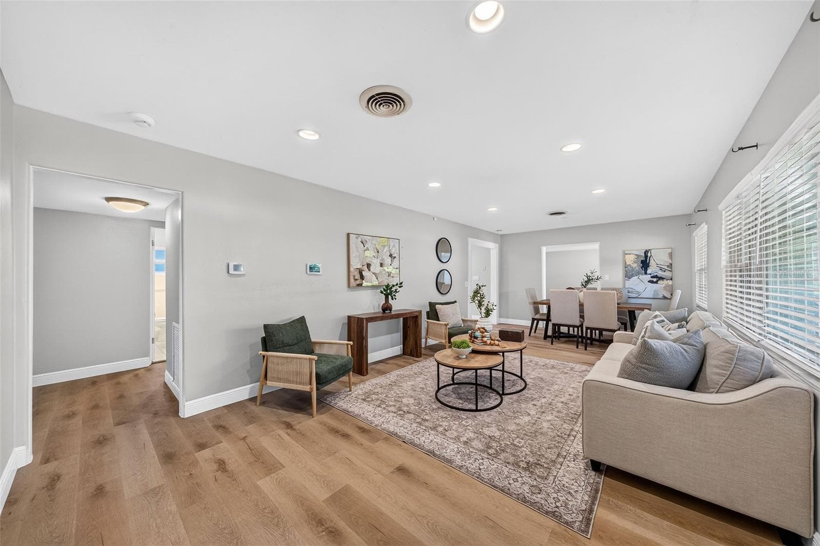 New luxury vinyl wide plank floors throughout all living spaces. - 1448 CUMBIE ST, ORLANDO