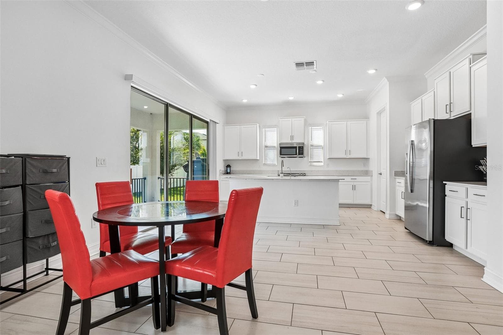 Single Family Residence at 7702 S KISSIMMEE ST, TAMPA, photo 5 of 37