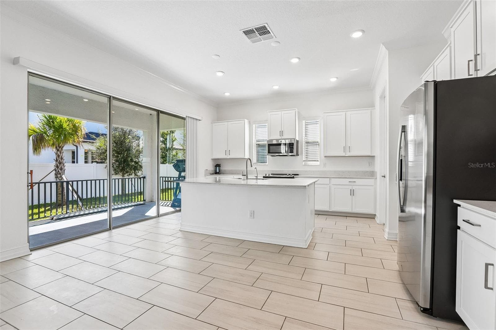 Single Family Residence at 7702 S KISSIMMEE ST, TAMPA, photo 8 of 37