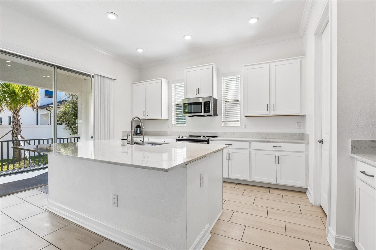 Single Family Residence at 7702 S KISSIMMEE ST, TAMPA, photo 9 of 37