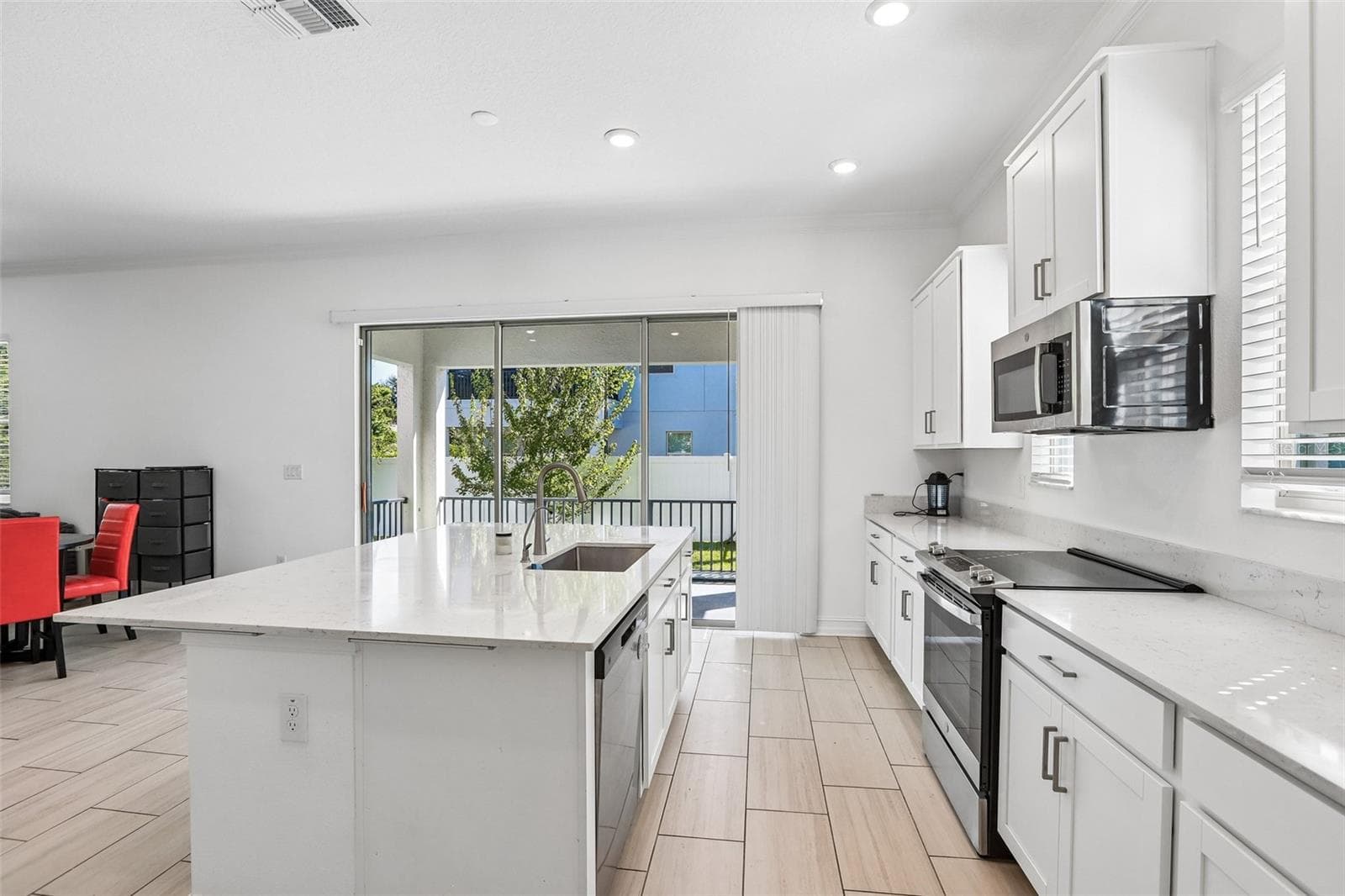 Single Family Residence at 7702 S KISSIMMEE ST, TAMPA, photo 12 of 37