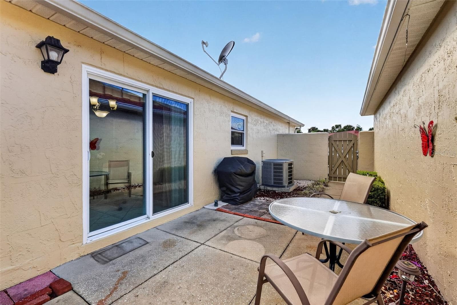 Spacious 45'x11' PRIVATE Side Courtyard and Rear Stoned Yard - 407 CARMEL AVE, THE VILLAGES