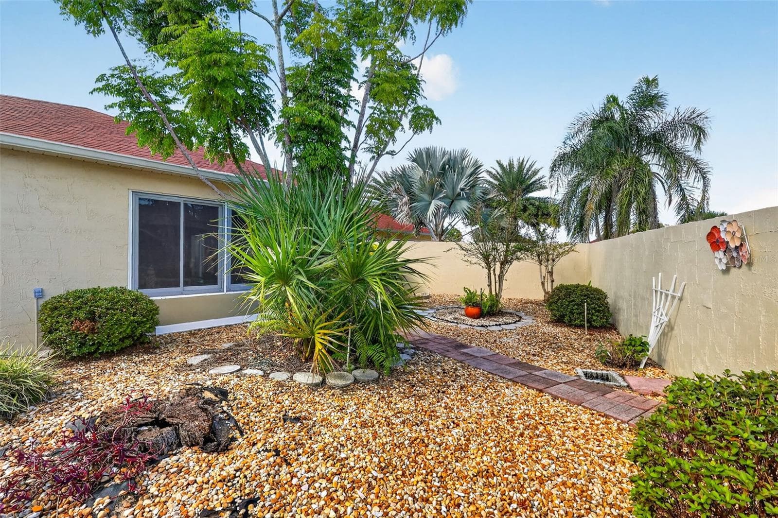 Rear Stoned Yard- NO GRASS! - 407 CARMEL AVE, THE VILLAGES