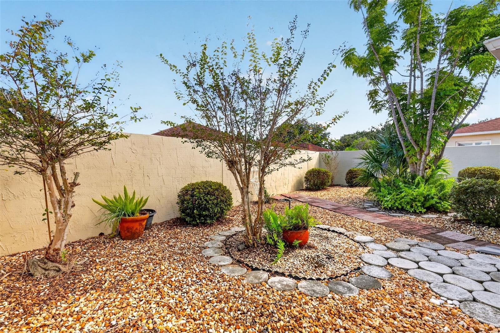 Rear Stoned Yard- NO GRASS! - 407 CARMEL AVE, THE VILLAGES