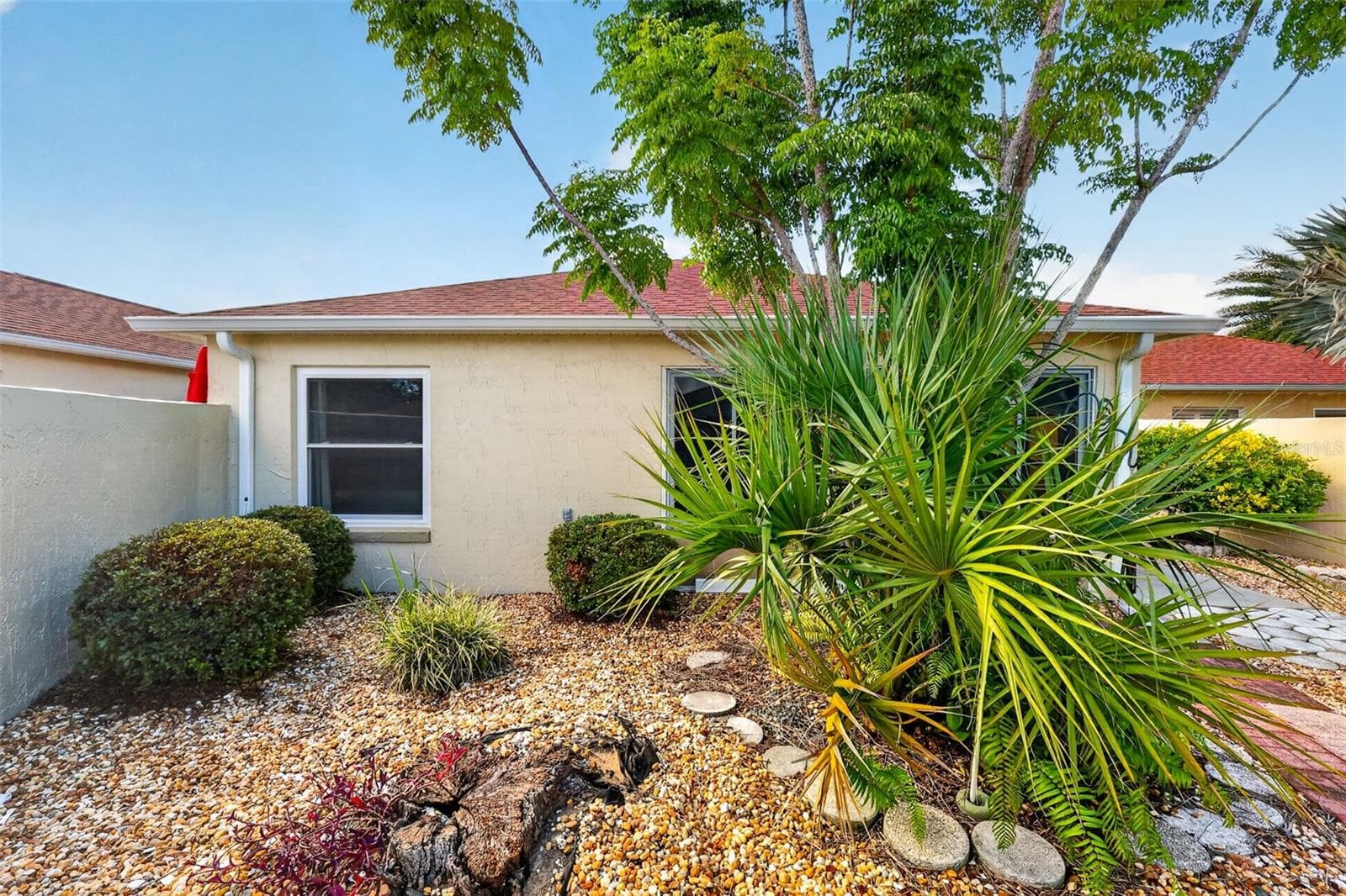 Rear Stoned Yard- NO GRASS! - 407 CARMEL AVE, THE VILLAGES