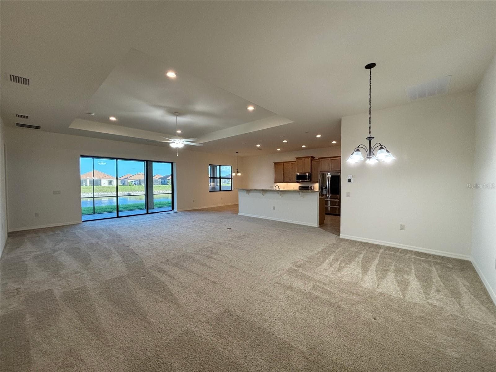 LR and Formal Dining Area. Trey Ceiling in LR - 6240 PINEHURST LOOP, WINTER HAVEN