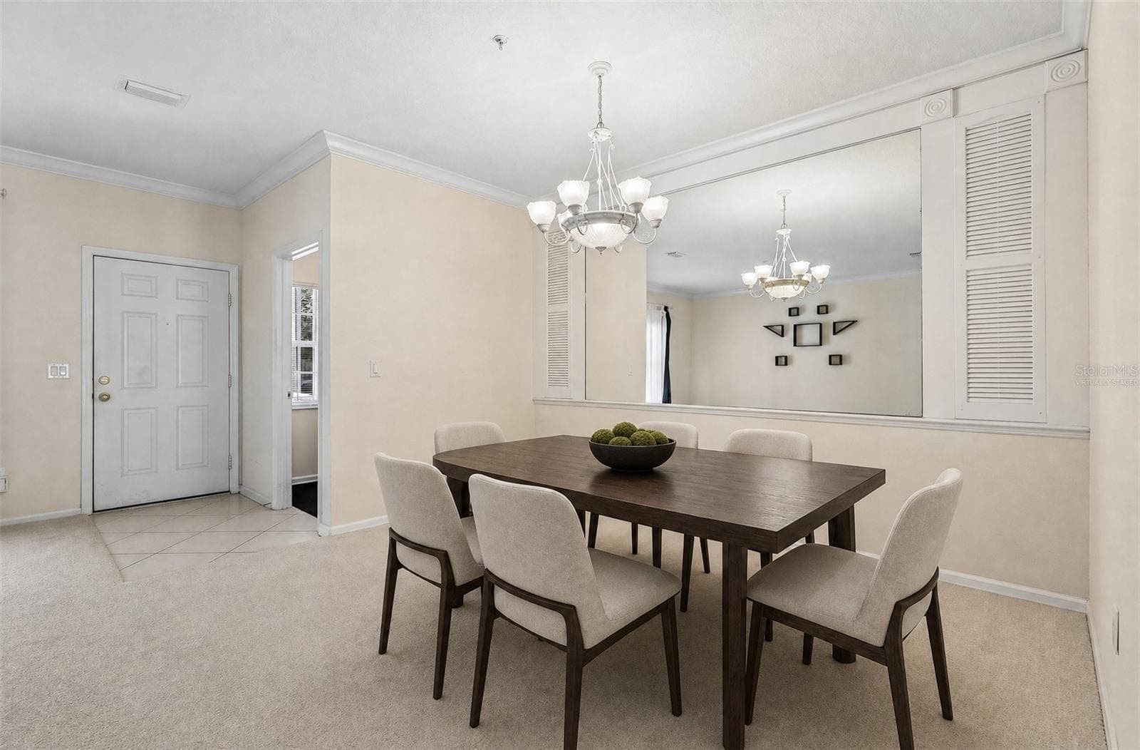 Formal dining at the front of the home. Virtually Staged. - 8525 WATERWILLOW PL, ORLANDO