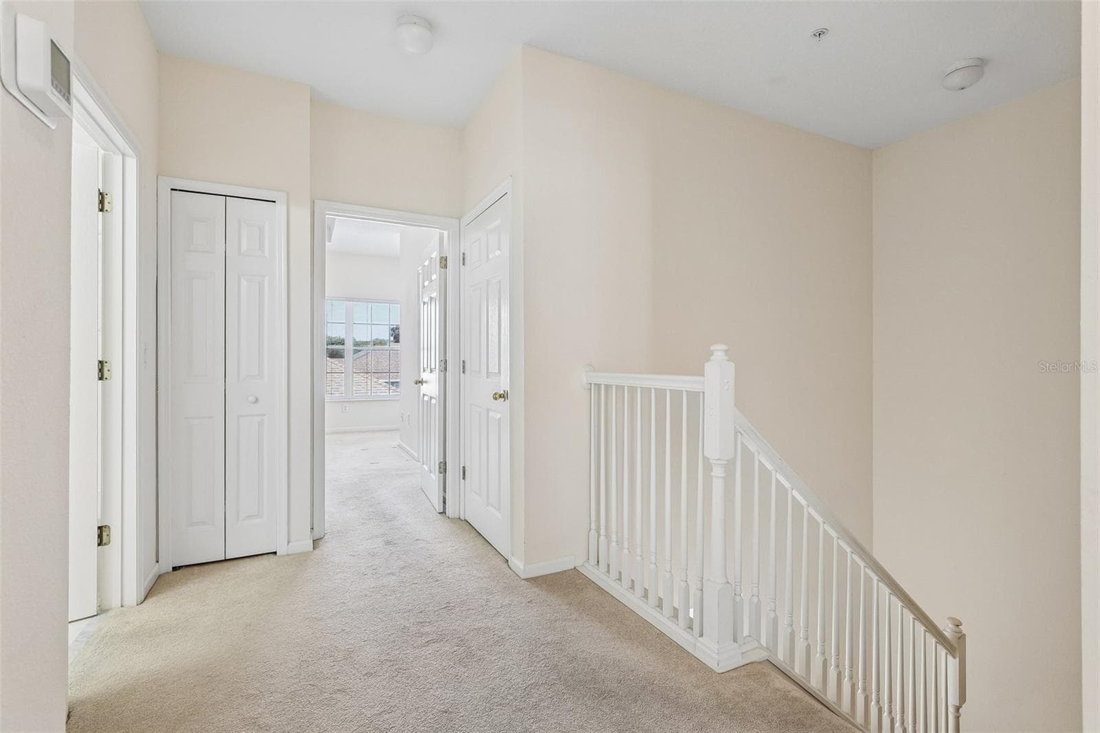 Second floor landing. - 8525 WATERWILLOW PL, ORLANDO