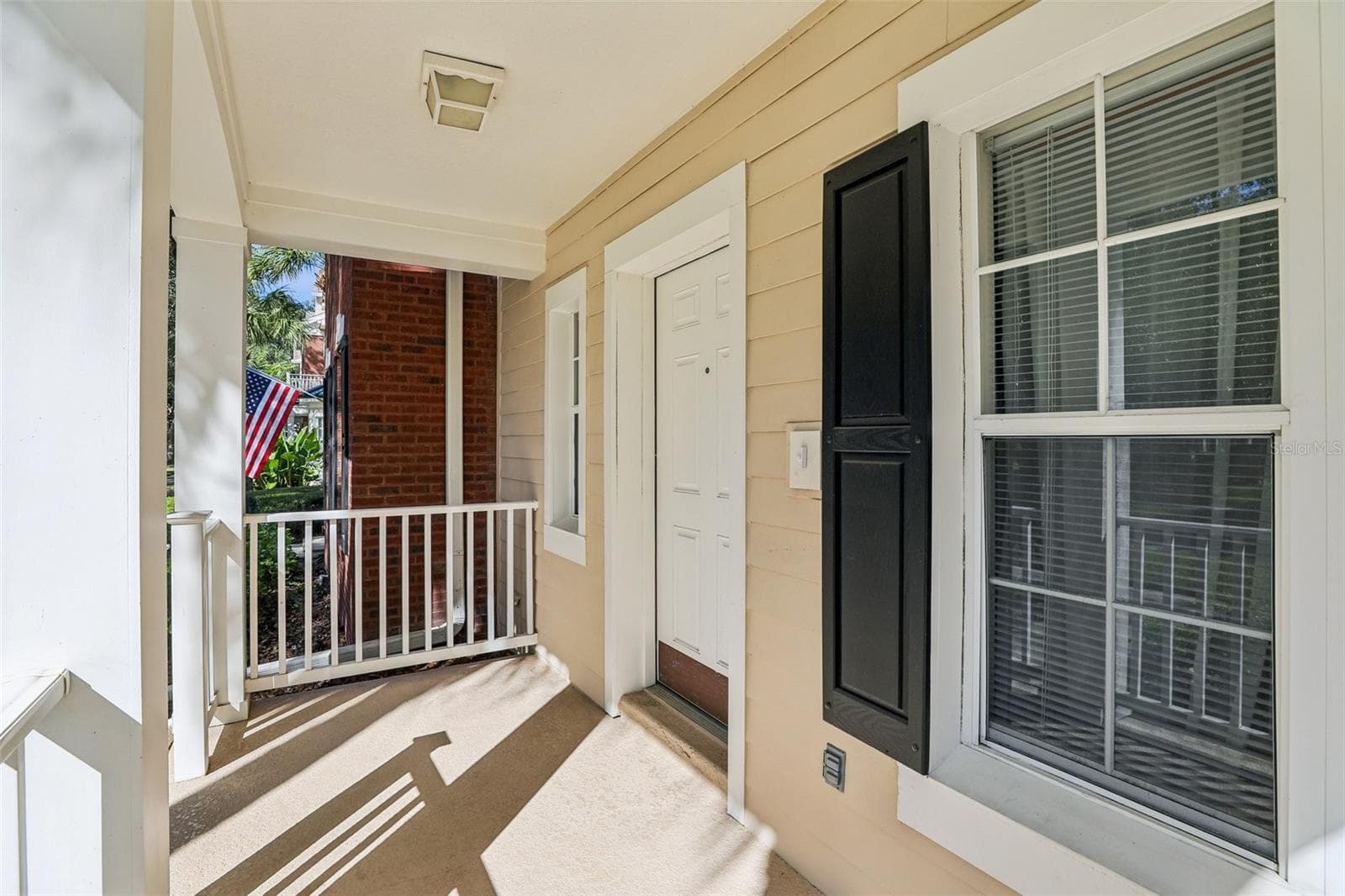 Covered front porch. - 8525 WATERWILLOW PL, ORLANDO