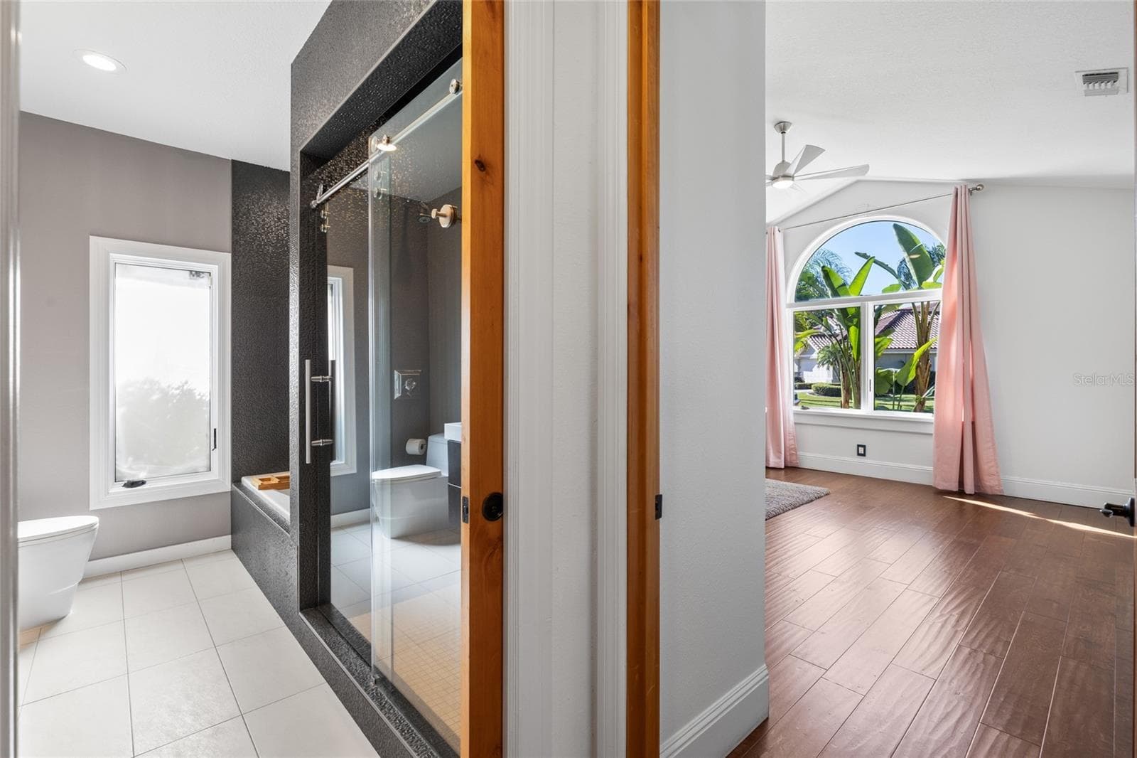 Hallway to bathroom 3 and bedroom 4 - 9805 COMPASS POINT WAY, TAMPA
