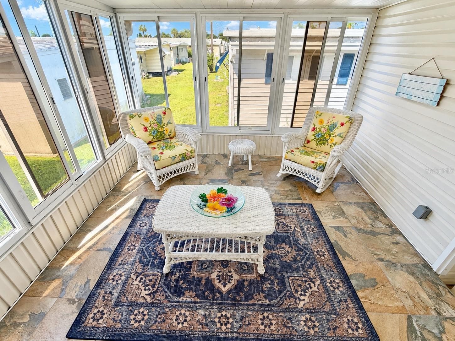 Sunroom - sliding windows, shown open here - 34012 AZALEA DR N, PINELLAS PARK