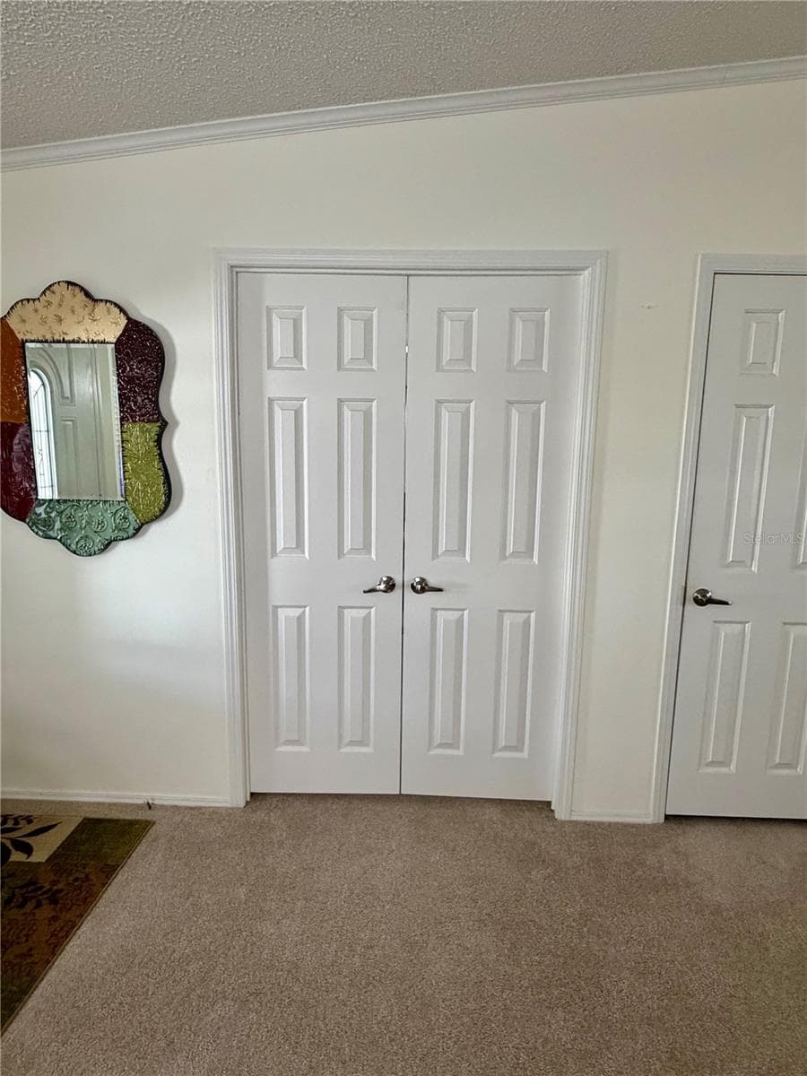 Double doors to the bonus/Office/possible third bedroom - 34012 AZALEA DR N, PINELLAS PARK
