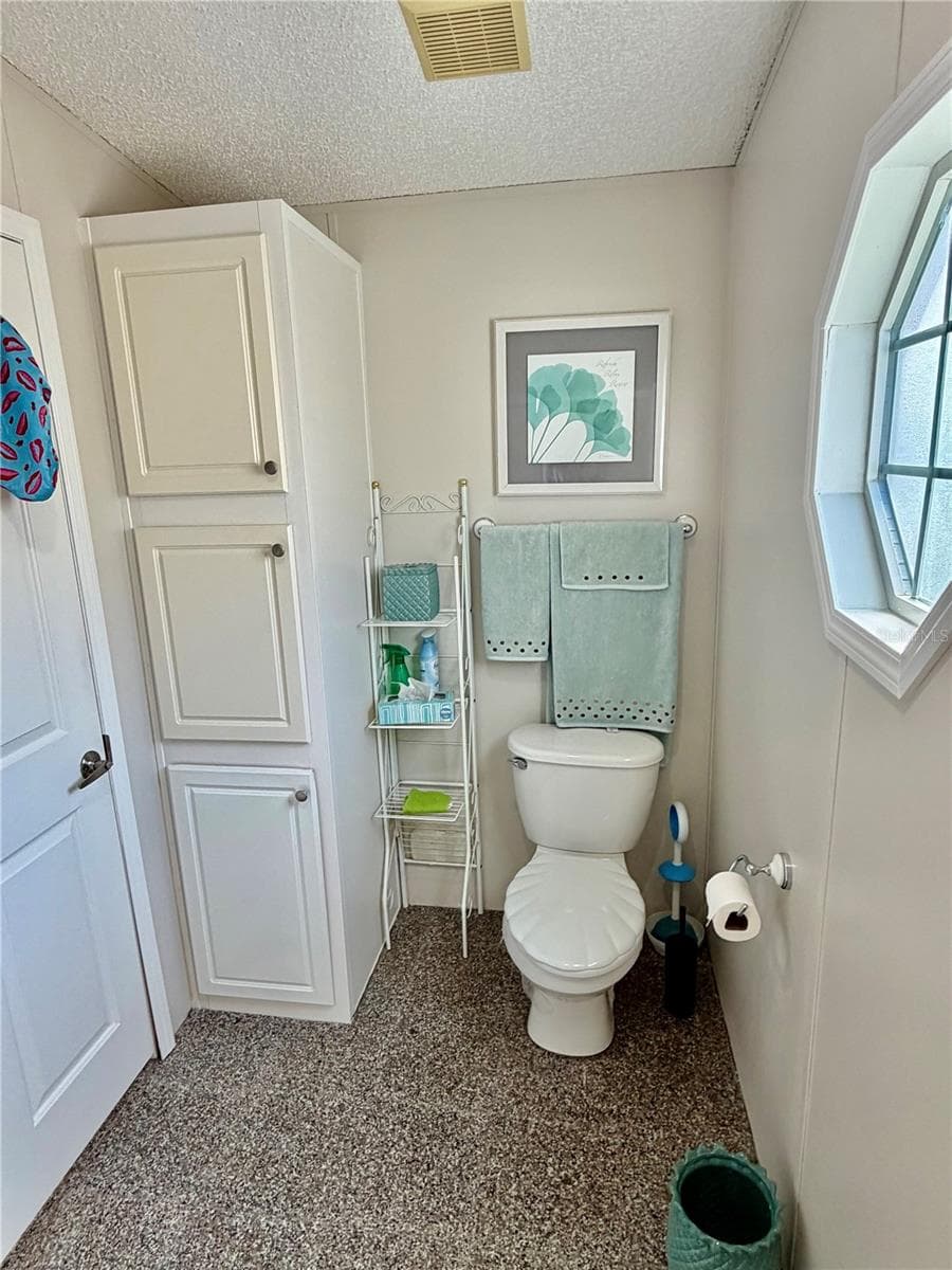 Primary suite as a separate shower and toilet room - 34012 AZALEA DR N, PINELLAS PARK
