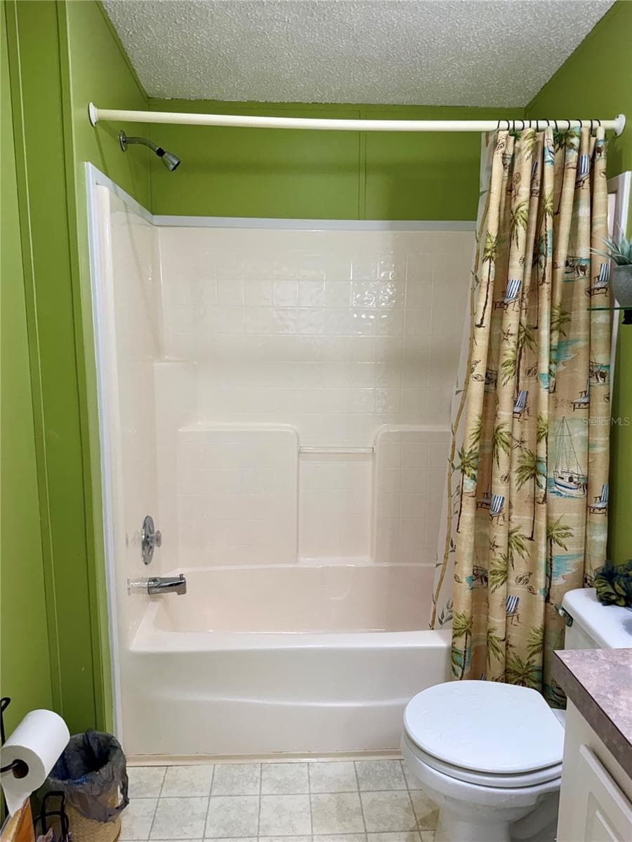 Guest bath, shower enclosure - 34012 AZALEA DR N, PINELLAS PARK