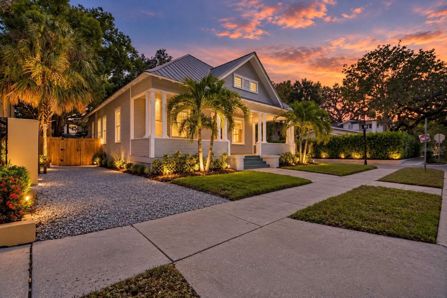 Digitally enhanced to showcase home at twilight. - 1918 W DEKLE AVE, TAMPA