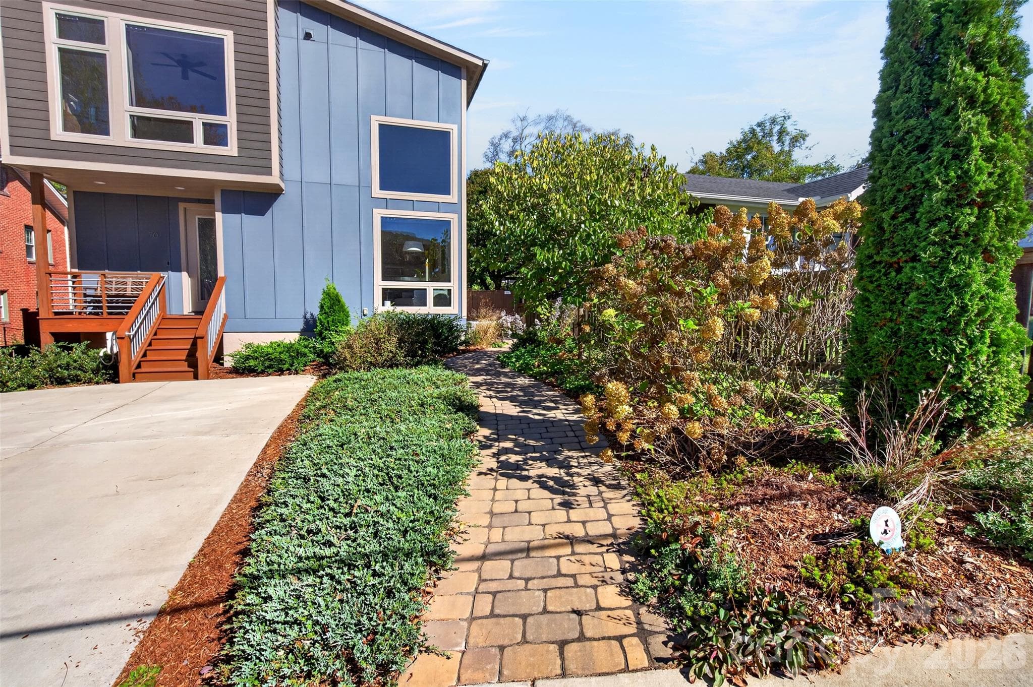 Sellers added landscaping and hardscape. - 70 Garden Circle, Asheville