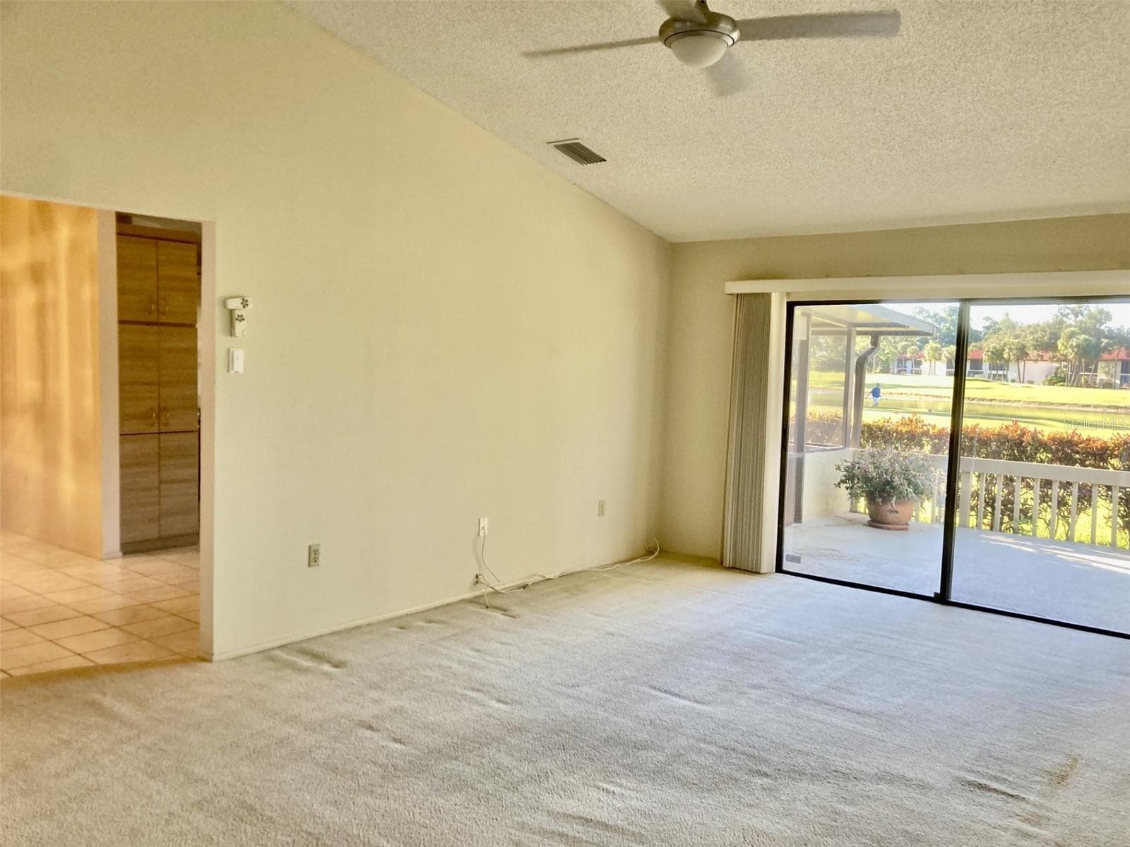 Living room - sliding doors to deck. - 3407 AVENIDA MADERA #A, BRADENTON