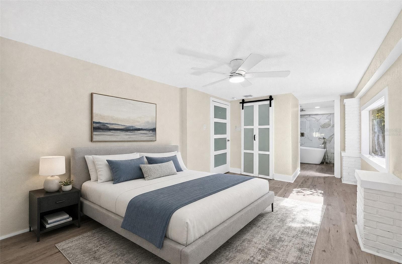 The Primary Bedroom features abundant windows, a large step-in closet and a PRIVATE EN SUITE BATH. Virtually Staged - 211 S MAPLE AVE, SANFORD