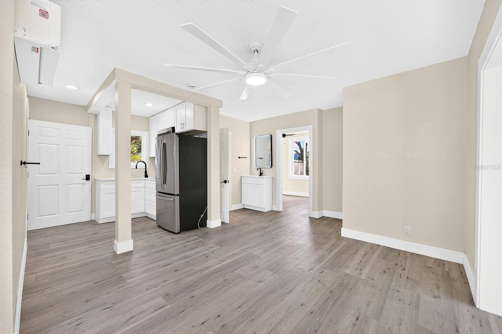 This two-Bedroom, one-Bath residence includes its own Kitchen, Living Room, Breakfast Nook and Sitting Room, creating a VERSATILE SPACE with room to spread out and feel at home. - 211 S MAPLE AVE, SANFORD