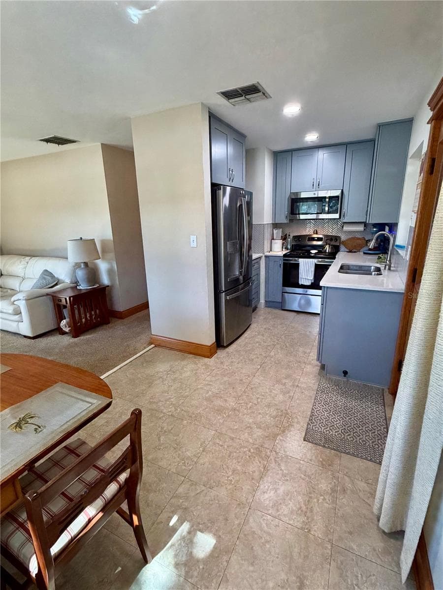 Living space is pretty open! - 6481 82ND AVE N, PINELLAS PARK