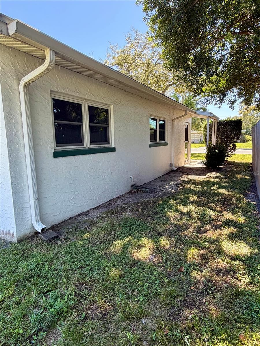 West side of home, where you will find 2nd entry to home - 6481 82ND AVE N, PINELLAS PARK