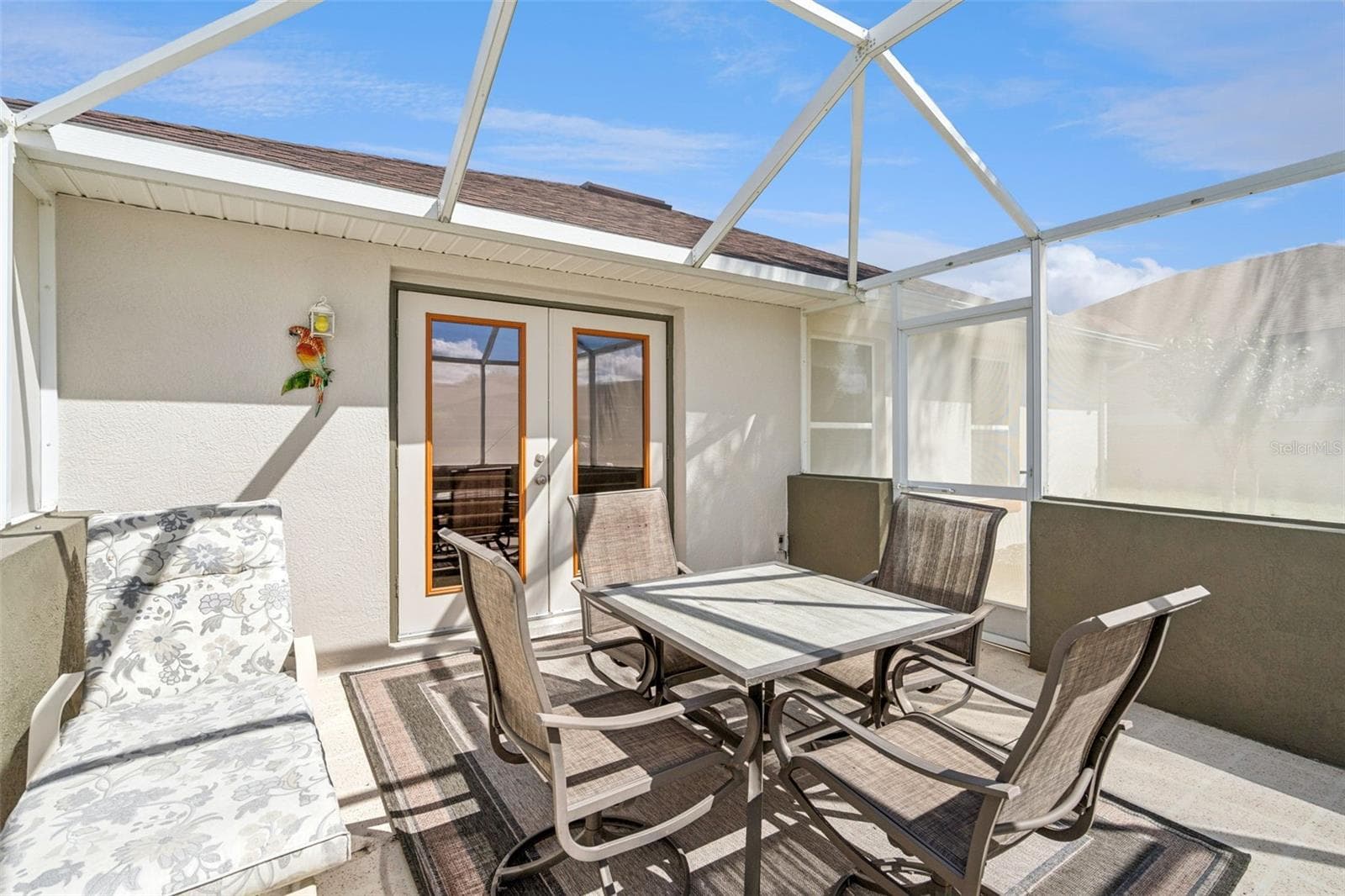 Screened Lanai - 13.5 X 13.4 - right through the Living Room French Doors. - 4900 CANOE CT, TAVARES