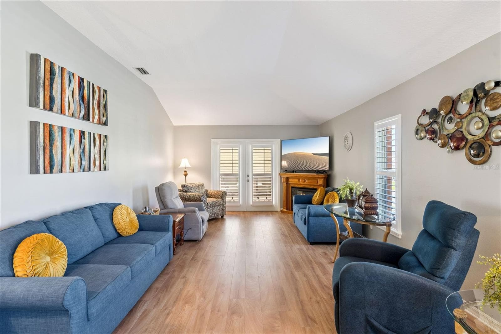 Living Room with French doors to the screened lanai. - 4900 CANOE CT, TAVARES
