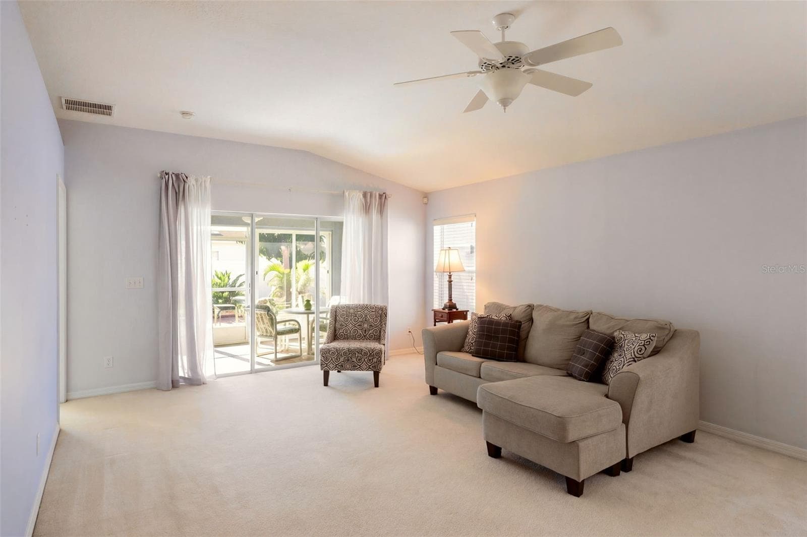 Living Room with Vaulted Ceilings - 3437 GRENVILLE DR, WINTER HAVEN