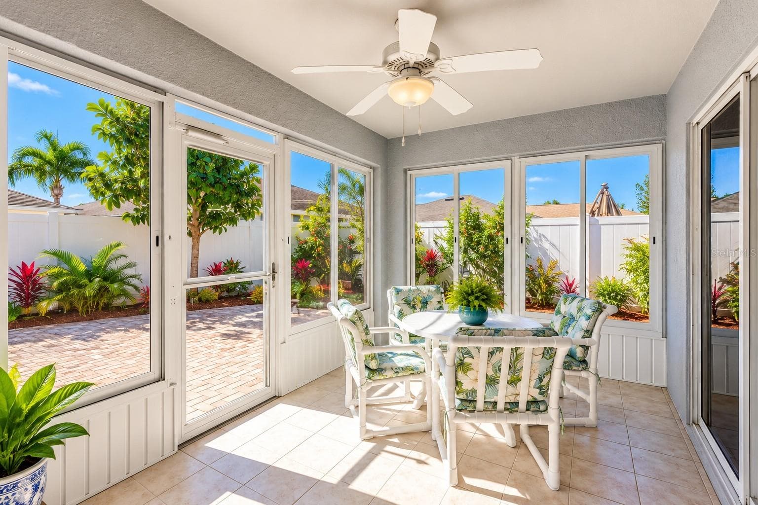 Enjoy outdoor living even during inclement weather from the Florida room - 3437 GRENVILLE DR, WINTER HAVEN
